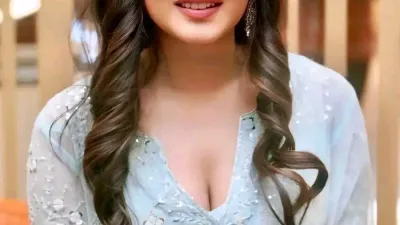 Mrs. Rupali Sen  fair-skinned, with a plump and voluptuous figure